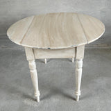 Klapbord - 101 cm Rundt klapbord creme med klapper oppe